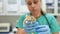 Veterinarian examines a toad in a veterinary clinic. Exotic animals.