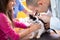 Veterinarian examining cat\'s hearing at vet ambulant