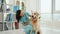 Veterinarian examining golden retriever dog in clinic