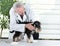 Veterinarian with miniature schnauzer