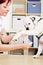 Veterinarian putting bandage on paw