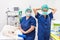 Veterinarian surgeons in operating room