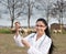 Veterinarian with syringe on farmland