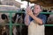 Veterinarian wears long glove to inspect cows