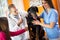Veterinarians curing Great Done dog in vet clinic