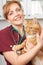 Veterinary Nurse Holding Cat In Surgery