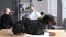 In the veterinary office. A large purebred dog and its owner are being examined by a veterinarian