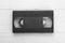 VHS tape from the 80s and 90s on white wood background