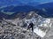 Via ferrata climber on a rock top view