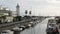 Viareggio: Burlamacca Canal and old, Lighthouse boats moored to the river bank