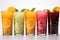 Vibrant Array of Citrus and Berry Iced Juices in Tall Glasses. AI generation
