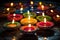 A vibrant assortment of candles transforms a tabletop into a blaze of color, Indian festival Diwali, oil lamps lit on colorful