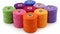 Vibrant assortment of colorful cotton thread spools for sewing and embroidery projects