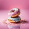 Vibrant assortment of colorful donuts stacked on plate, tempting, delicious treats. For advertise cafe, pastry shop