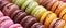 Vibrant Assortment Of Delectable Macarons In Various Hues And Flavors