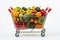 Vibrant assortment of fresh vegetables and fruits in fully stocked supermarket metal shopping cart