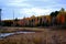 Vibrant autumn colors in Upper Michigan with prairie and small creek