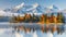 Vibrant autumn sunrise at high tatra lake with majestic mountains and pine forest reflection