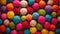 Vibrant background texture adorned with colorful multicolored felt balls, Ai Generated