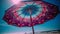 Vibrant beach umbrella shades in clear blue sky, perfect summer day generated by AI