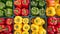 Vibrant bell peppers display, ideal backdrop for culinary concepts and healthy eating themes.