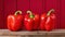 Vibrant Bell Peppers on Red Background AI Generated