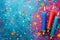 Vibrant Birthday Celebration Background with Colorful Confetti, Stars, and Lit Candles on a Glittery Blue Surface