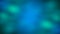 Vibrant blue and green blurred background with bright accents