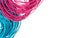 Vibrant blue and pink string rope with white copyspace