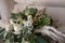 Vibrant bouquet of fresh flowers showcased on a white chair