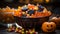 A vibrant bowl of orange-hued pumpkins, squash, and gourds brings a festive halloween spirit