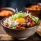 A vibrant bowl of vegetarian bibimbap with crispy tofu, colorful vegetables, and a fried egg