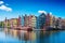 Vibrant Buildings: Dancing Over Amsterdam's Amstel River. AI