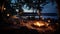 a vibrant campfire burning in a cast iron fire pit on a forest beach, with the enchanting backdrop of light bulb