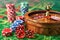 Vibrant Casino Gaming Table with Stacked Chips, Rolling Dice, and Wooden Roulette Wheel