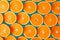 Vibrant citrus backdrop Background filled with slices of juicy oranges