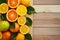 Vibrant citrus fruits create a lively scene on white wood