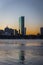 Vibrant city skyline of Boston with illuminated skyscrapers against a night sky