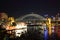 Vibrant city Sydney at Harbour Bridge with Luna Park by night