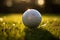 Vibrant Close-up of Golf Ball on Tee with Beautiful Blurry Green Bokeh Background