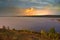 Vibrant Cloudy Sky Over A Fall Park Lake