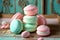 Vibrant colored pastel French macaroons in pink and mint flavours