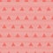 Vibrant coral and pink textured triangle design on a textured stripy grunge background. Seamless vector pattern in
