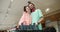 Vibrant Couple's Supermarket Poses: Happy Brunette Pair Posing and Having Fun