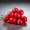 Vibrant Cranberries: Captivating Close-up Photography Of Red Cranberries On A Gray Surface