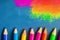 Vibrant Crayons on Blackboard Drawing: Back to School Background.