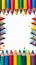Vibrant creativity colorful crayons frame border on a white background