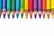 Vibrant creativity colorful crayons frame border on a white background