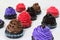 Vibrant Cupcakes in brown, red and purple color