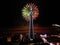 Vibrant display of fireworks illuminating the night sky at the cityscape of Blackpool.